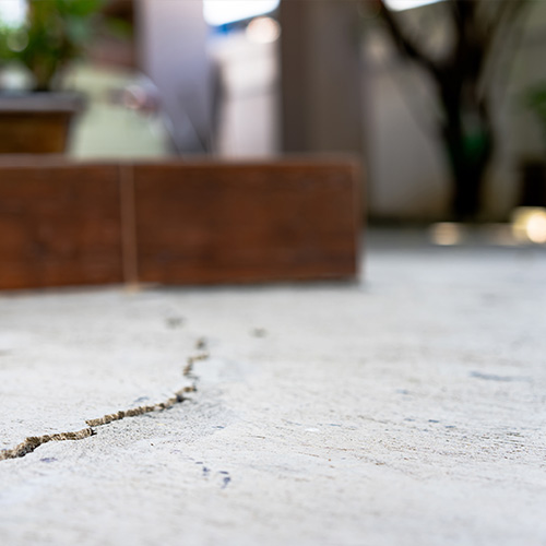 Worn, damaged Concrete Floor